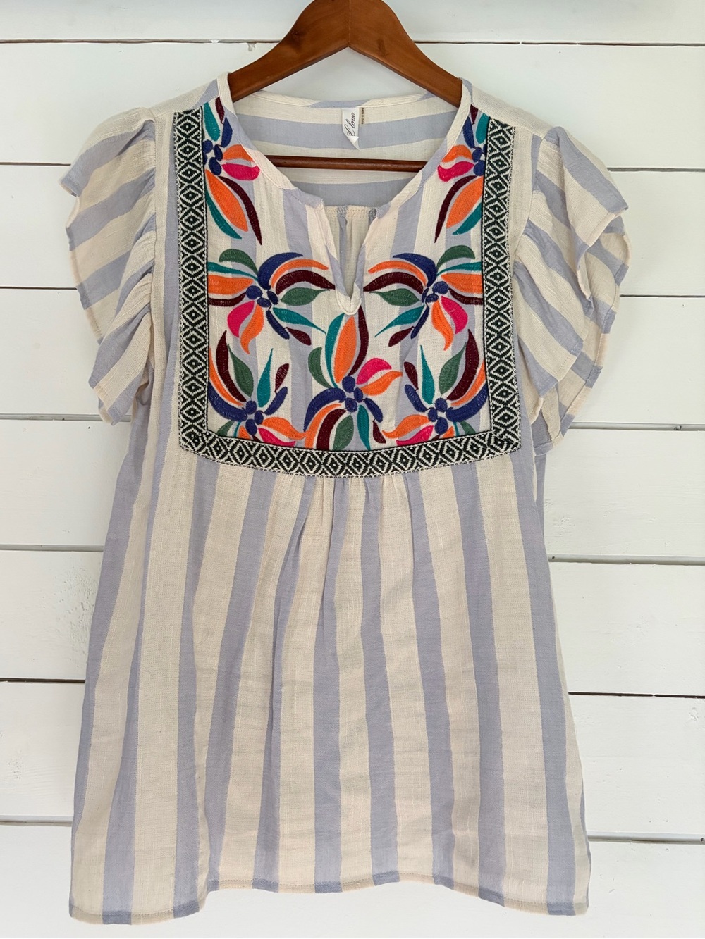 L Love embroidered tunic top. Size: Medium.